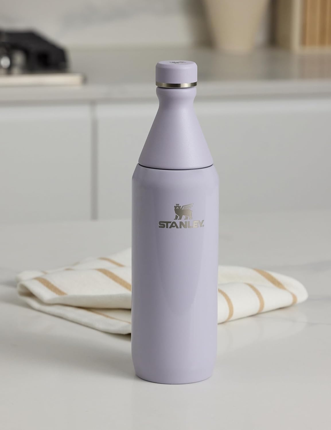 image:imageStanley All Day Slim Bottle 20 oz Twist On Lid with Leakproof Seal Slim Design for Travel amp Gym Insulated Stainless Steel BPAFree Daffodil GlossPurple Dust Gloss