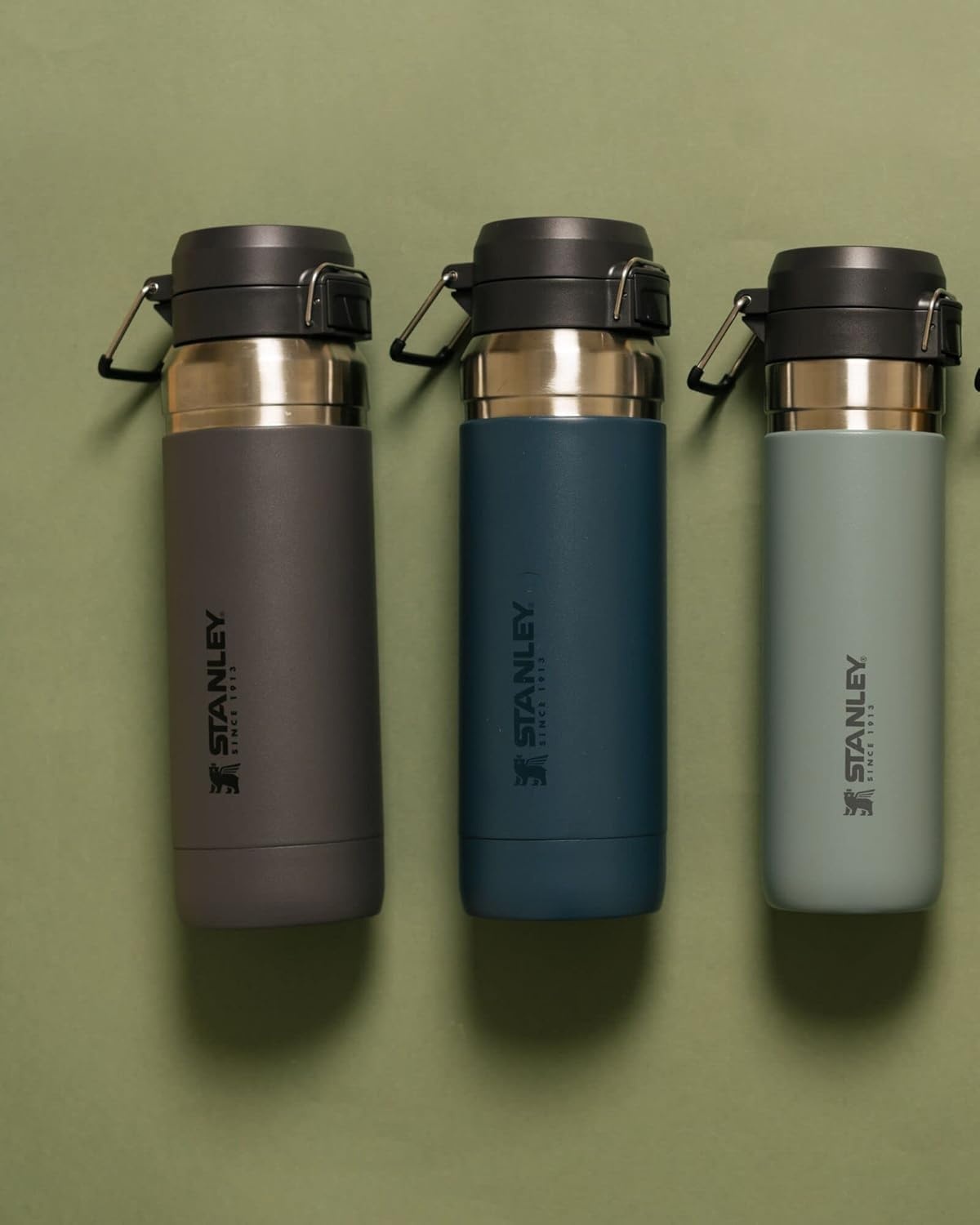 image:imageStanley Quick Flip GO Water Bottle 36 oz Push Button Lid Leakproof and Packable for Travel and Sports Insulated Stainless Steel BPAFree BlackCharcoal