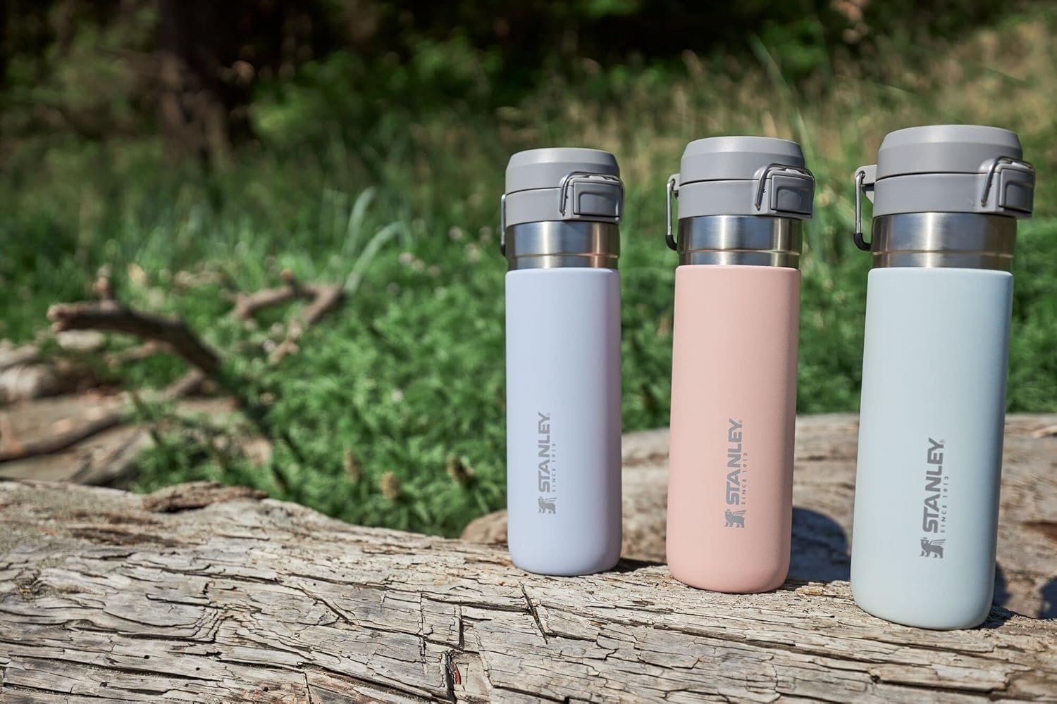 image:imageStanley Quick Flip GO Water Bottle 36 oz Push Button Lid Leakproof and Packable for Travel and Sports Insulated Stainless Steel BPAFree BlackGuava